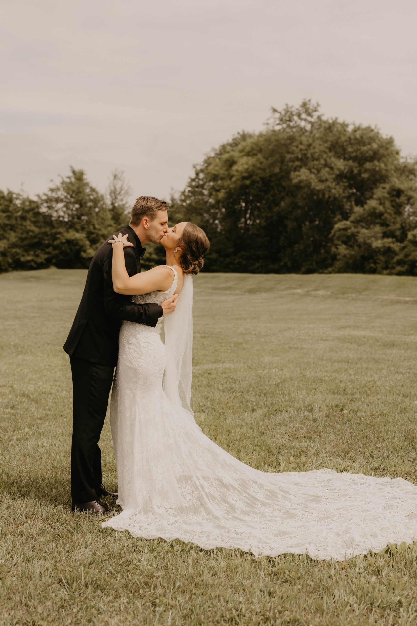 Bride and groom kissing